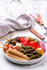 Assortment of marinated or pickled vegetable.