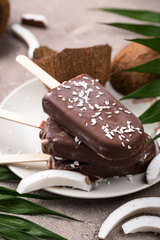 Coconut popsicles in chocolate glaze
