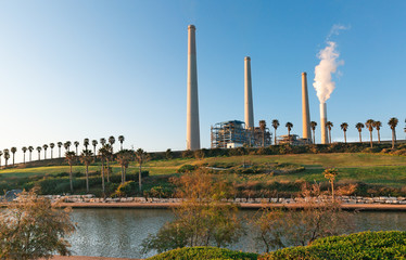 The power plant on the Mediterranean coast at sunset