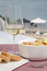 Delicious meal served on the balcony with sea view.
