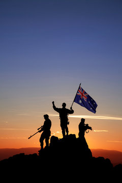 Three Armed Soldiers With The Australian Flag