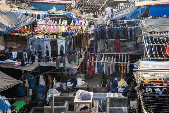  The Dhobi Ghat is a well known open air laundromat where thousands of people work daily washing and drying clothing and linens