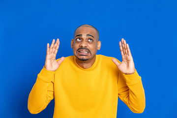 African guy with yellow jersey