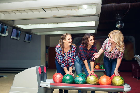 Three Funny Attractive Girlfriends Take Bowling Balls