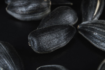Sunflower seeds in  macro on black background