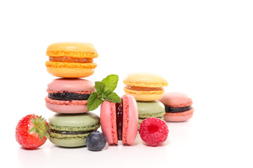 assorted of colorful french macaroons isolated on white background