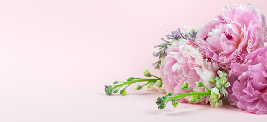 Very beautiful bouquet of flowers from peonies, and lilacs , spring plants close-up. Holiday concept. Flowers for Mother's Day. Copy space.