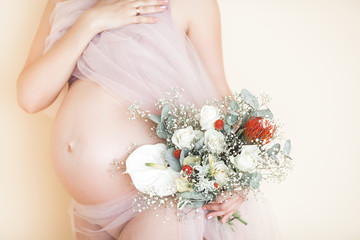 Obraz na płótnie Canvas Young attractive pregnant woman indoors. Maternity concept.