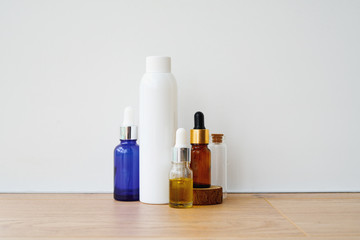 Empty bottles on white background. Diy cosmetics with natural ingredients