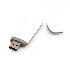Compact device (flash card, modem, electronic key) isolated on a white background