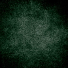 Green designed grunge texture. Vintage background with space for text or image