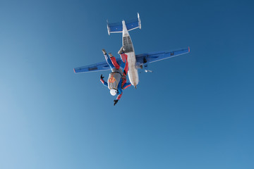 Fototapeta na wymiar Tandem skydiving. The start of new jump.