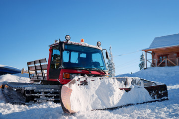 Huge snow machine truck outdoor.