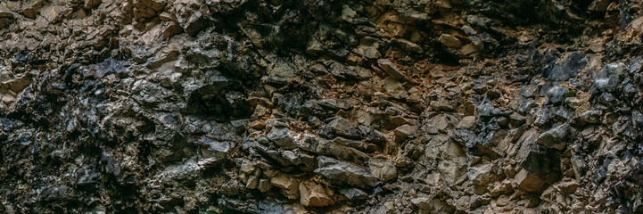 Fototapeta na wymiar cliff rocks texture with mixed rocks