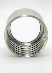 Stainless steel sleeve on a light background.