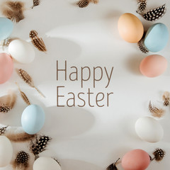 Natural Colored brown, quail and white Eggs with sunlights. Compositions in pastel colors. Easter consept.  Flat lay, top view .