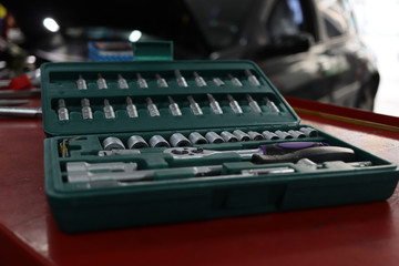 Close-up view of a toolbox in a car workshop