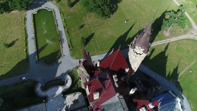 Aerial view of The Moszna Castle in Poland, the one of the most magnificent castles in the world. Famous places in Europe to see. World heritage