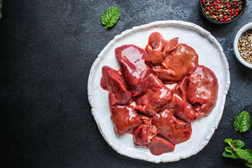 raw chicken liver (healthy eating) keto or paleo diet menu concept background. top view. copy spaces for text