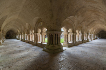Ancient marble Column corridor of a medieval French abbey. Abbey of Fontenay, Burgundy, France,...