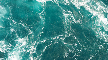 Background of the sea, clean deep ocean with air bubbles, foam on the surface of the ocean. foam...