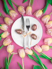 dinner plate with gold easter eggs, bow, tulips