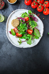 Healthy quinoa salad leaves mix (mix micro greens, cucumber, tomato, other ingredients) menu concept background. top view. copy space for text