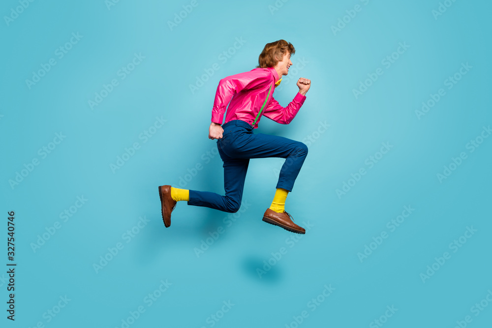 Poster full size profile side photo of redhair red hairenthusiastic guy jump run spring time discounts wear