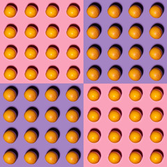 Orange pattern on pink and violet background. Creative food concept. Flat lay