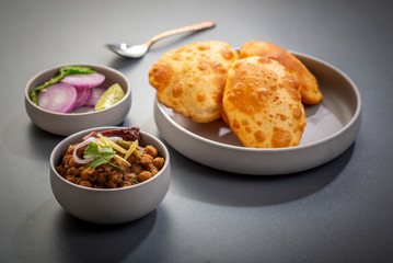 choley bhature is a dish originated initially in the northern part of the Indian subcontinent.  It is a combination of chana masala and bhatura, a fried bread made from maida.