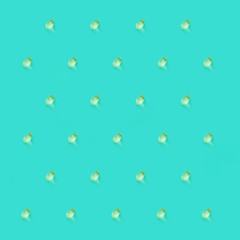 Vitamin d pattern on turquoise background.