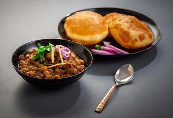 choley bhature is a dish originated initially in the northern part of the Indian subcontinent.  It is a combination of chana masala and bhatura, a fried bread made from maida.