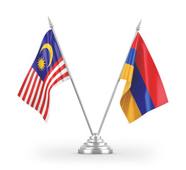 Armenia and Malaysia table flags isolated on white 3D rendering