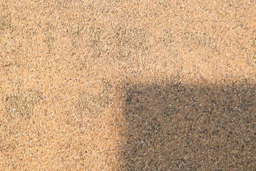 Concrete floor background, Old and stained, Divided by shadow of the house roof.