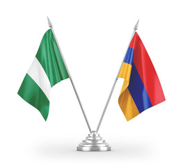 Armenia and Nigeria table flags isolated on white 3D rendering