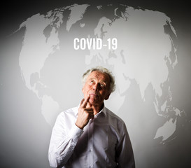 Old man and Covid-19. Coronavirus in the World.