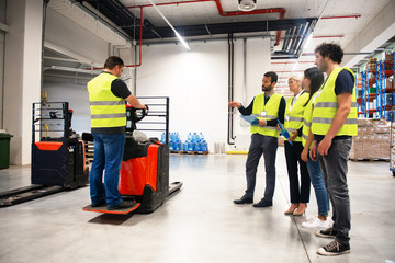 Training on a forklift, managers and workers