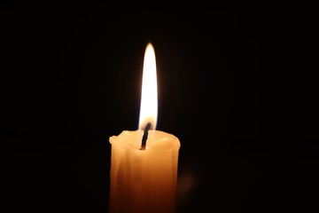 Candle black background of mourning funeral moment of silence	