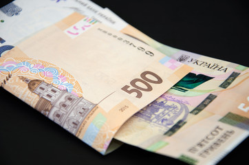 Obraz premium 500 hryvnia on a black background.