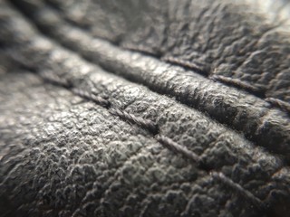 Black leather watch strap background
