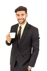 A handsome businessman is sipping coffee with a bright smile isolated on white background,