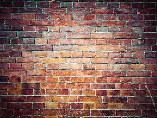 Brick wall background. Brown and red bricks, masonry texture of a building exterior