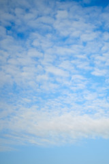Feather clouds on blue sky, background, copy space for text