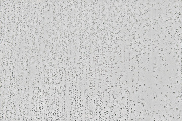 Water drops on glass, window background