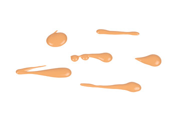Liquid foundation swatch isolated on white background. Close Up of makeup cream sample.