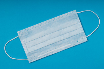 Typical 3-ply surgical mask to cover the mouth and nose.  2019-nCoV virus infection preventive gear.