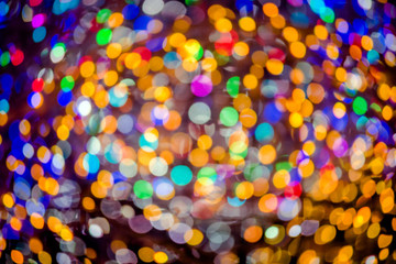 Multicolored Lights holiday illumination in defocused form
