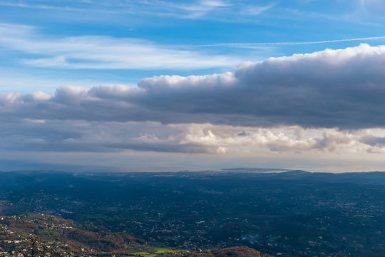 The Panoramic View Of Côte D'Azur Under The Cloudy Sky And The Meditarrenean Sea Coastline In The Horizon