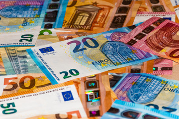 Heap of euro banknotes lying chaotically