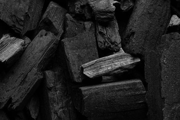 Black minimalistic design. Texture of coal. Burn wood. Copy space. Modern poster or booklet cover.